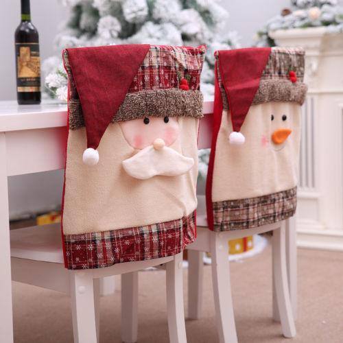 a couple of christmas stockings sitting on top of a table