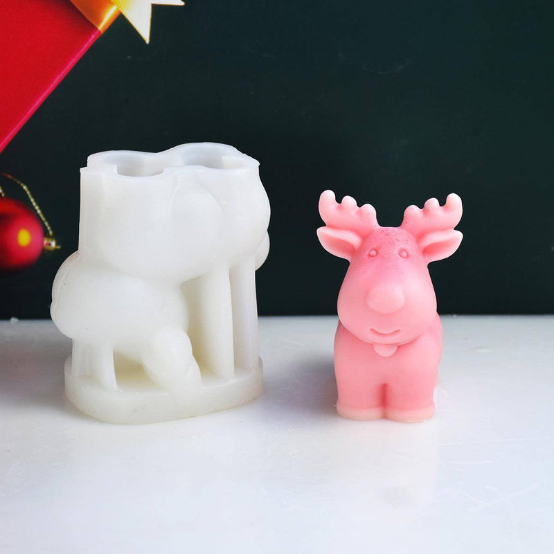 a small plastic animal next to a candle holder