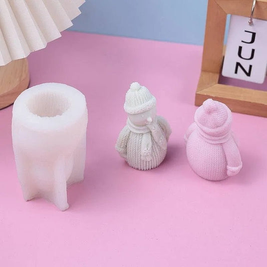 Handmade snowman candles made with silicone mold