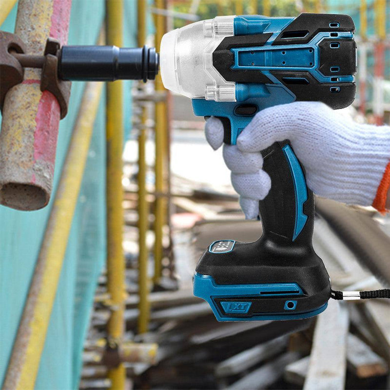 a person holding a cordless drill in their hand
